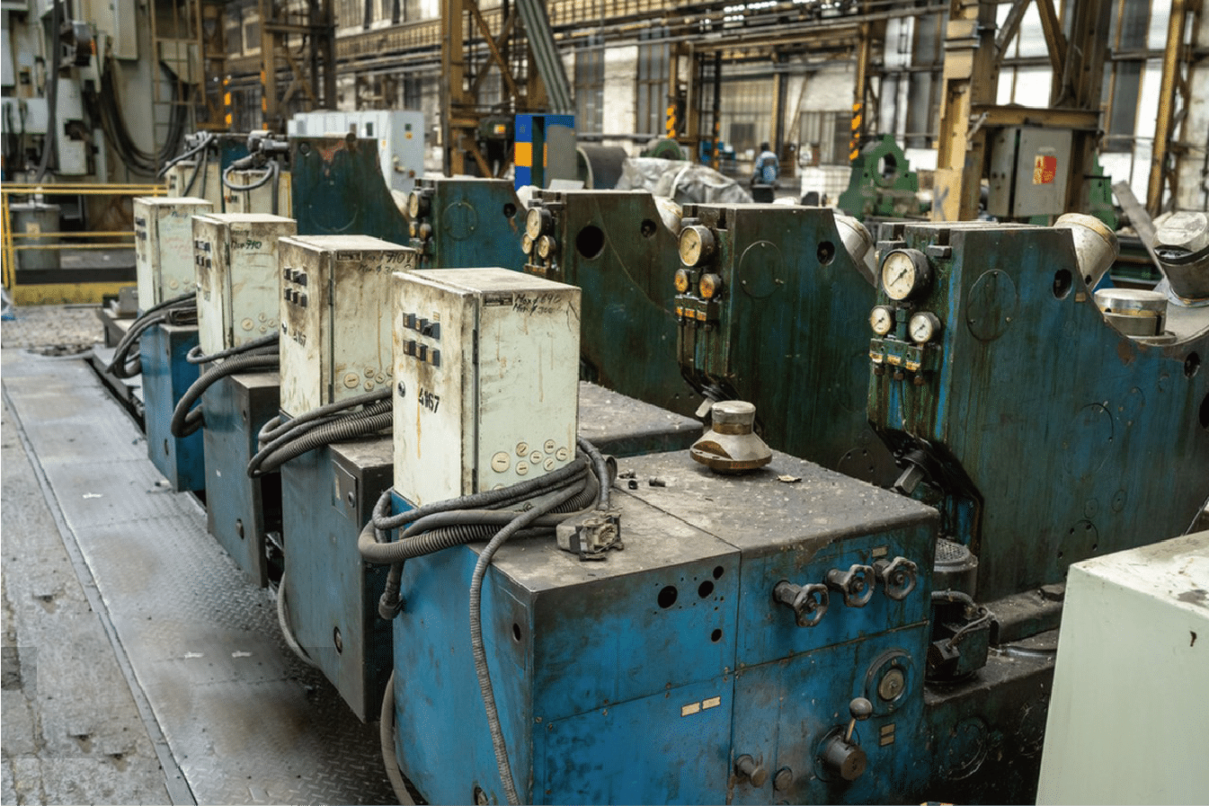 Heavy-duty stainless steel processing equipment in a factory