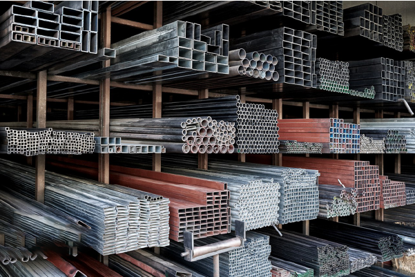 Various stainless steel pipe shapes and sizes in warehouse racks