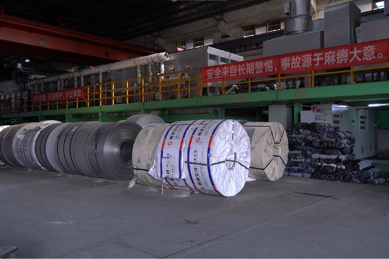 MFY stainless steel coils neatly stored in a production warehouse, ready for international shipment.