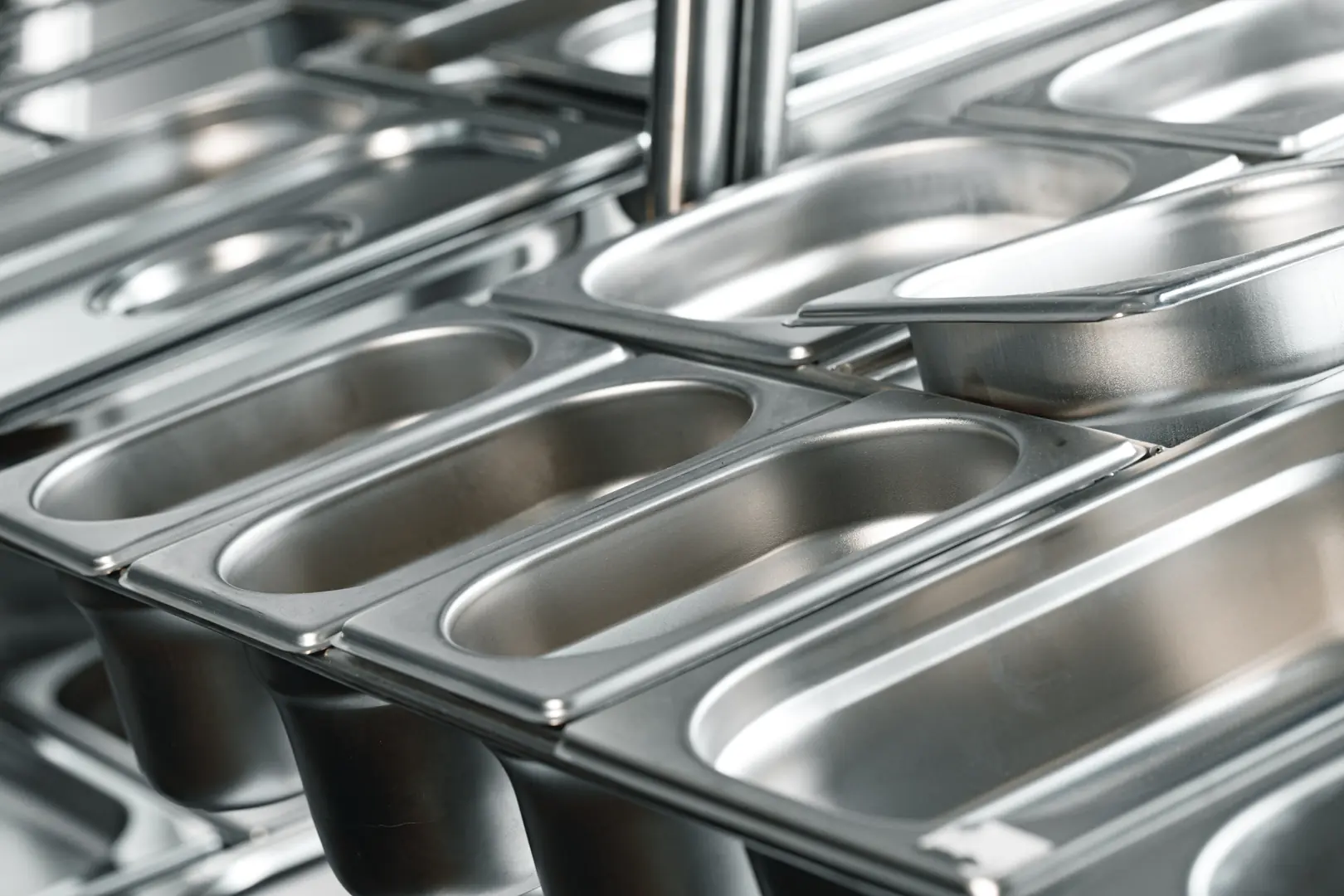 Close-up of high-quality stainless steel containers reflecting light